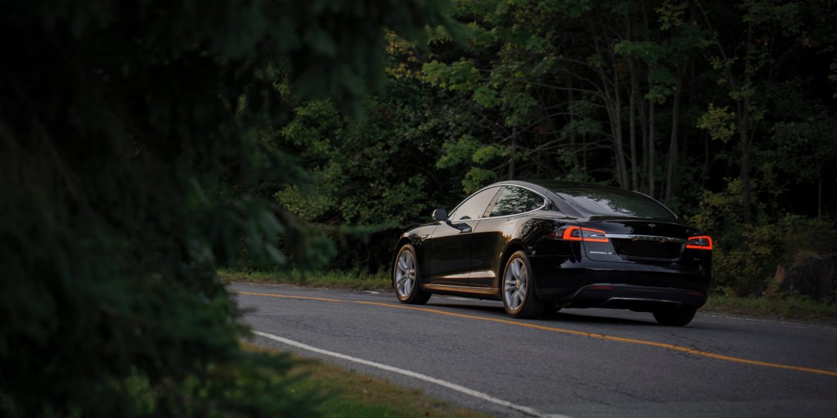 jp-valery-1052513-unsplash electric car driving through the countryside and nature