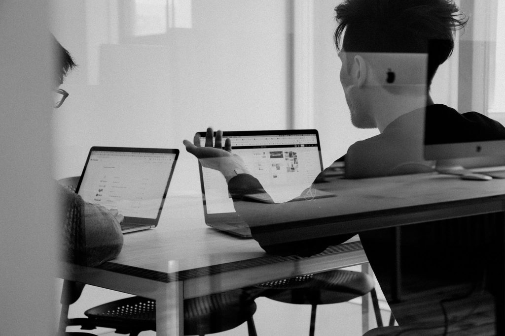 sustainable board meeting between two people on their laptops