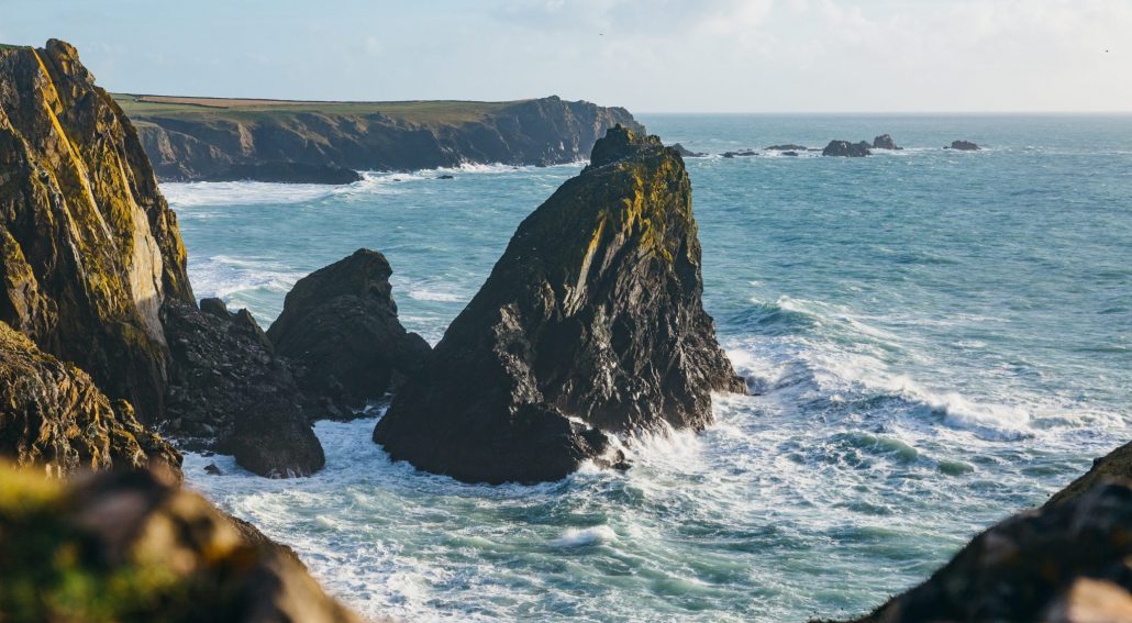 mike-erskine-b4AD8zSAozk-unsplash rock formation in Cornwall signalling intent to support the united nation sustainable development goals