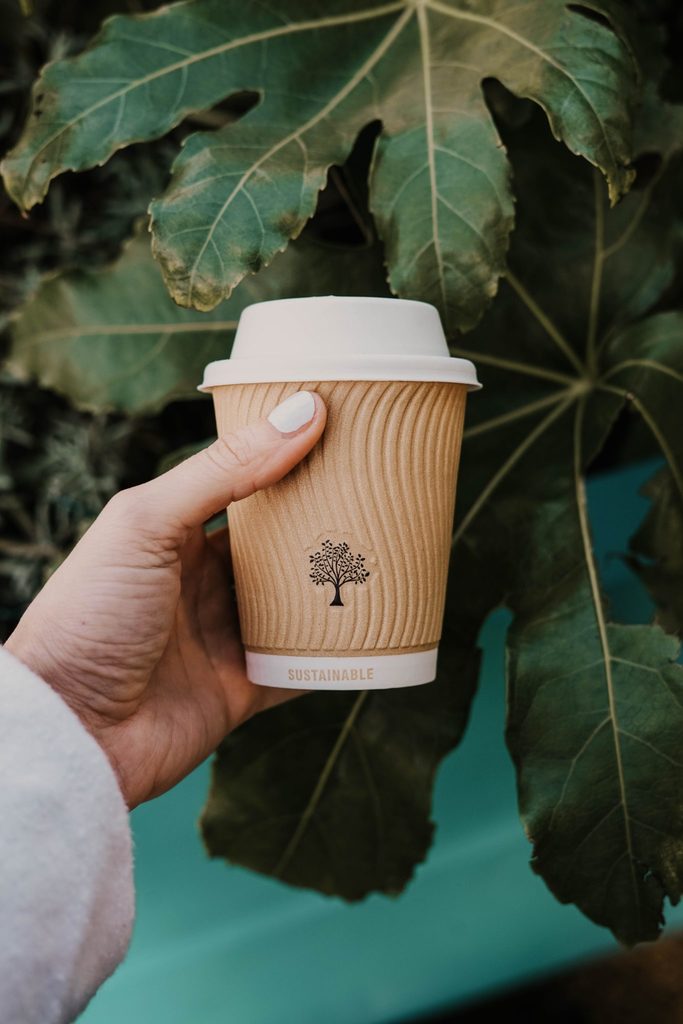 Holding a sustainable cup of coffee