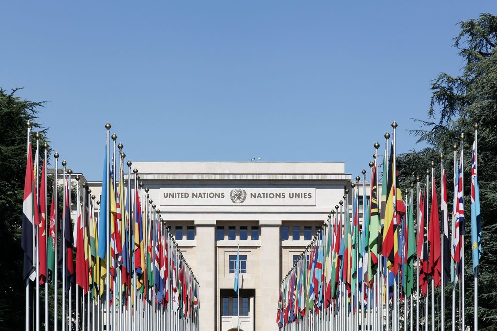 United Nations headquarters showing all the flags of the many nations that make up the UN, including the UK.