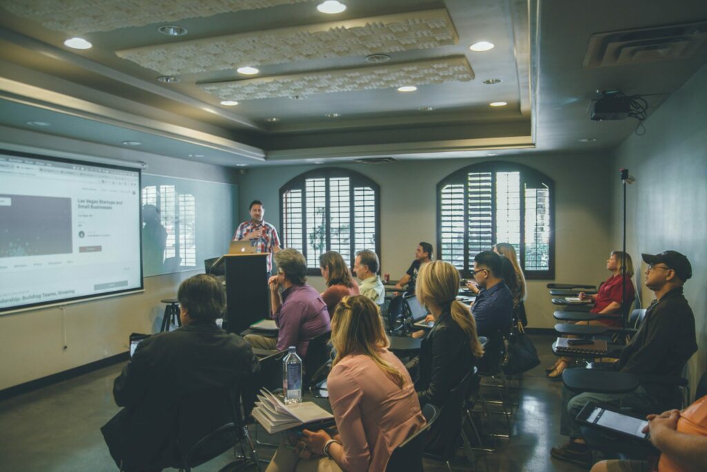 A group of people coming together to discuss quality education